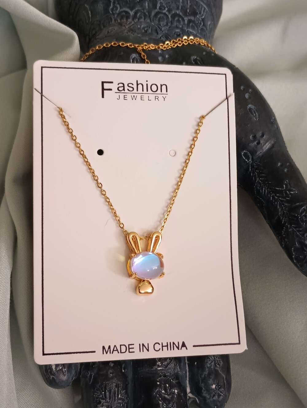 Fashion Jewelry Gold Bunny Necklace with Opalescent Blue Stone - Picture 2 of 11
